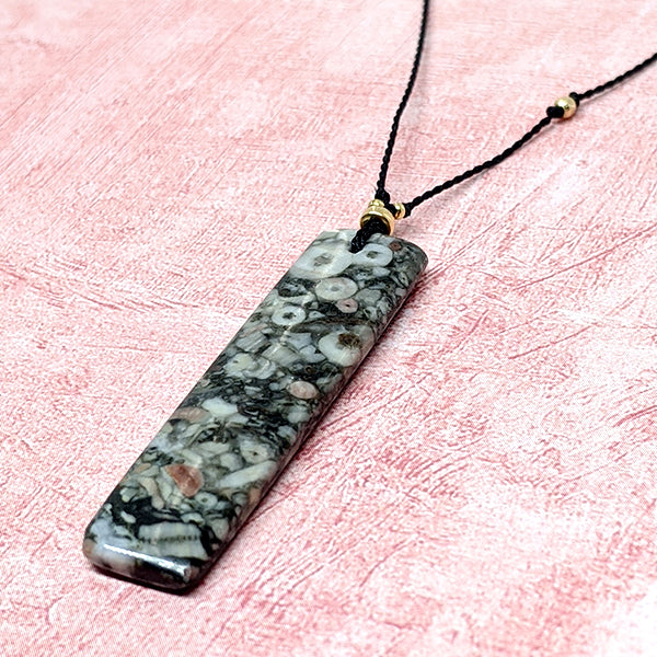 Mottled Black Crinoid Fossil Rectangle Cutstone Pendant 3