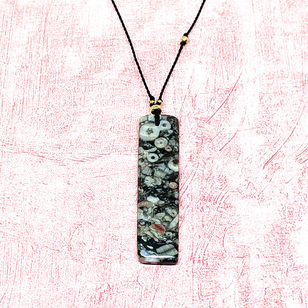 Mottled Black Crinoid Fossil Rectangle Cutstone Pendant 4