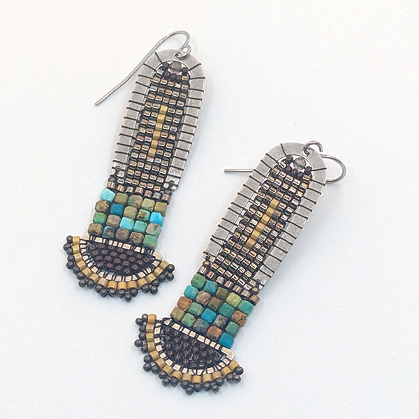 Beaded earrings with geometric pattern on a white background